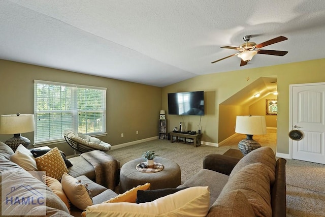 1653 Hawthorne Rd, Townsend, GA 31331 - living room featuring carpet, lofted ceiling, a ceiling fan, baseboards, and a textured ceiling