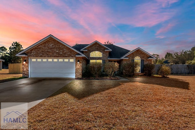 view of front of property featuring a garage