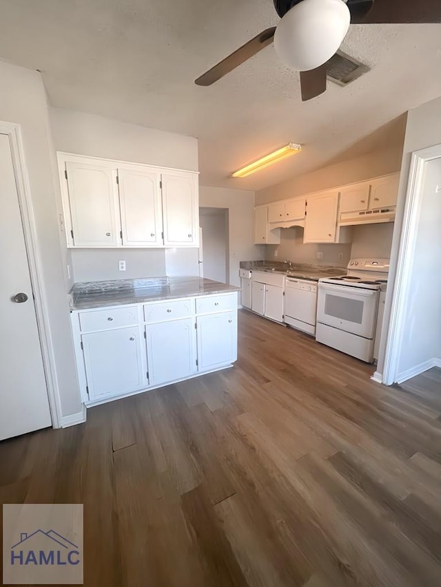 kitchen featuring white cabinetry, ceiling fan, dark hardwood / wood-style floors, and white appliances