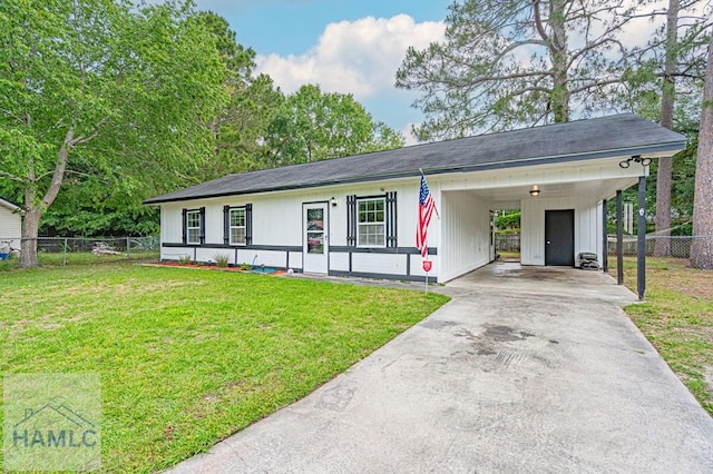 view of front facade with driveway and an attached carport