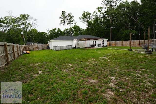 21 Oak Ridge Cemetery Rd SW, Ludowici, GA 31316 - view of yard featuring a patio and view of scattered trees