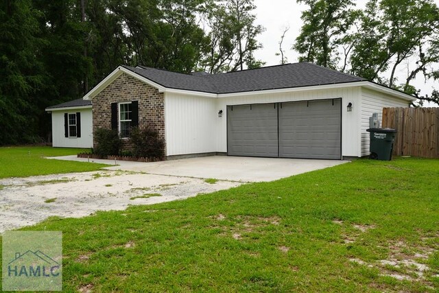 21 Oak Ridge Cemetery Rd SW, Ludowici, GA 31316 - garage with driveway