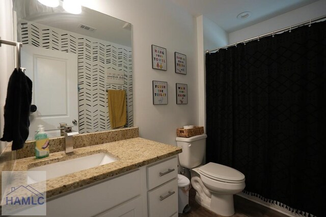 21 Oak Ridge Cemetery Rd SW, Ludowici, GA 31316 - full bathroom featuring vanity and toilet