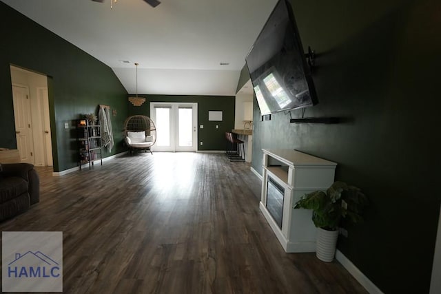 21 Oak Ridge Cemetery Rd SW, Ludowici, GA 31316 - unfurnished living room with wood finished floors, a fireplace, a ceiling fan, baseboards, and vaulted ceiling