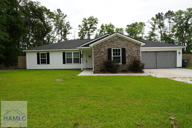 21 Oak Ridge Cemetery Rd SW, Ludowici, GA 31316 - ranch-style house featuring concrete driveway, a garage, and brick siding