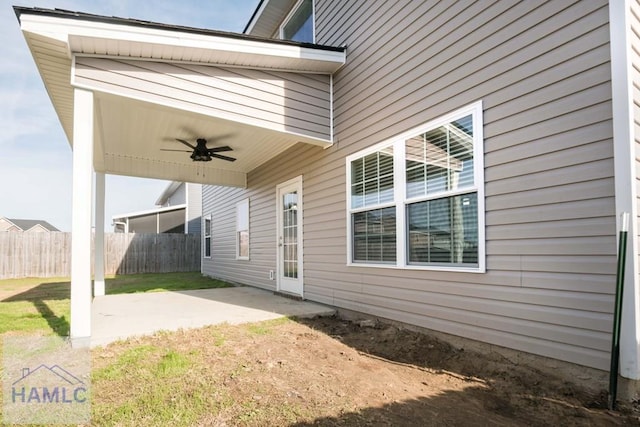 exterior space featuring ceiling fan