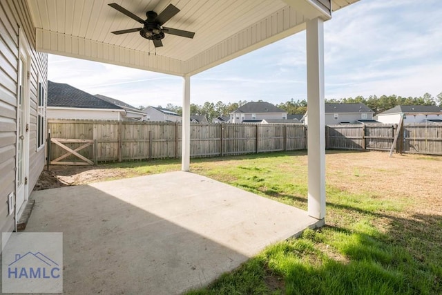 view of patio featuring ceiling fan