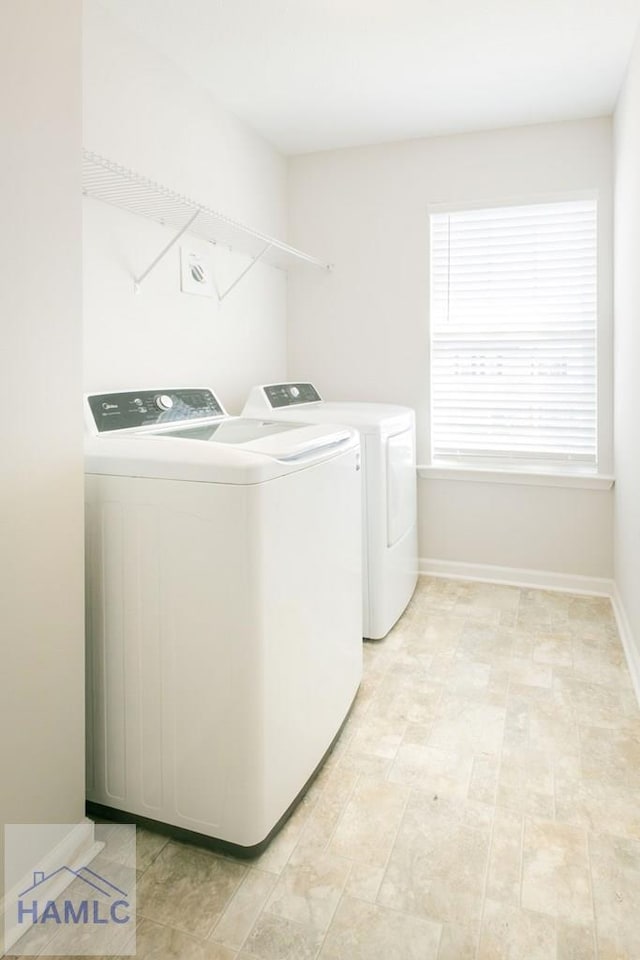 laundry area with washer and clothes dryer