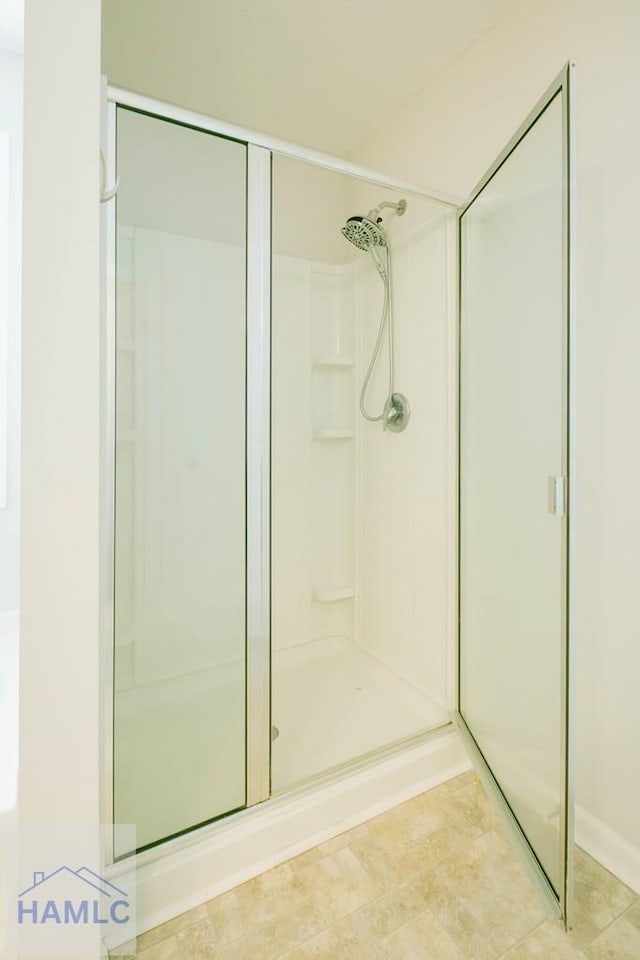 bathroom with an enclosed shower