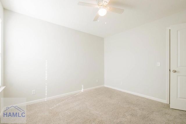 unfurnished room with carpet flooring and ceiling fan