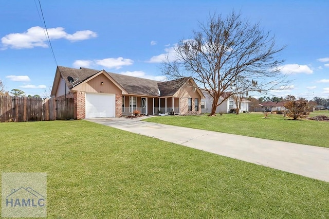 single story home with a garage and a front lawn