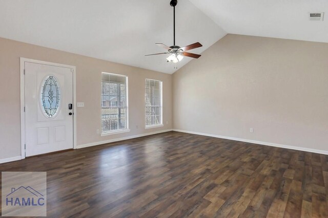 entryway featuring ceiling fan, lofted ceiling, and dark hardwood / wood-style flooring