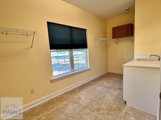 spacious closet with sink