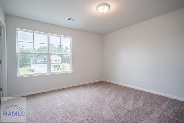 55 Enclave Way NE, Ludowici, GA 31316 - carpeted empty room featuring baseboards