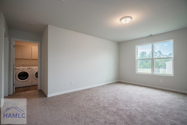 55 Enclave Way NE, Ludowici, GA 31316 - unfurnished room with washing machine and dryer and carpet flooring