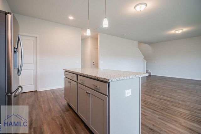 55 Enclave Way NE, Ludowici, GA 31316 - kitchen featuring stainless steel fridge with ice dispenser, dark wood-style floors, gray cabinets, a center island, and pendant lighting