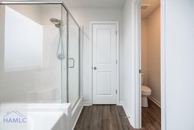 55 Enclave Way NE, Ludowici, GA 31316 - full bath featuring a shower stall, wood finished floors, and a bath