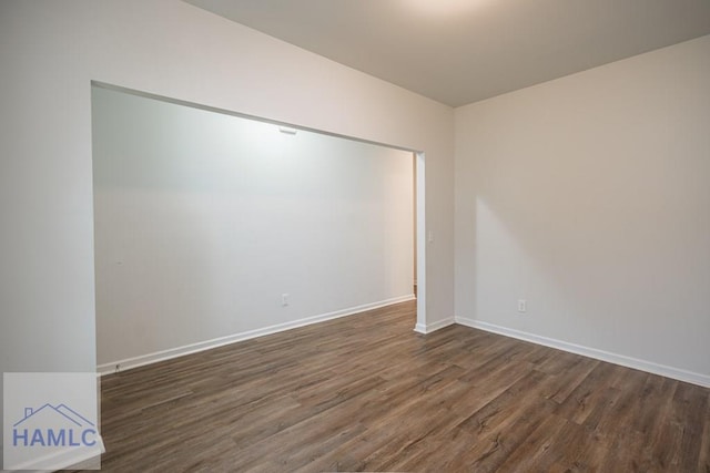 55 Enclave Way NE, Ludowici, GA 31316 - empty room with dark wood-style flooring and baseboards