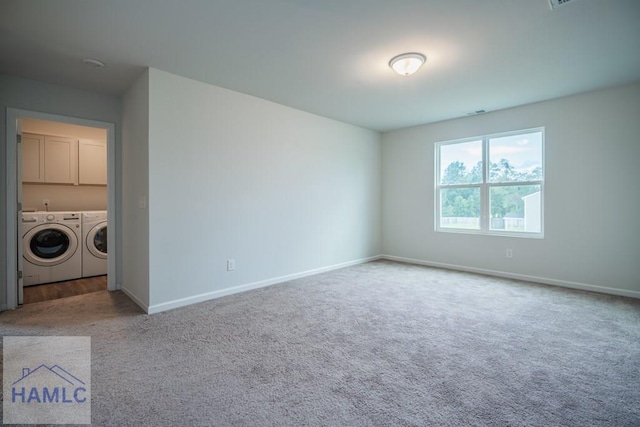 55 Enclave Way NE, Ludowici, GA 31316 - spare room with separate washer and dryer and carpet