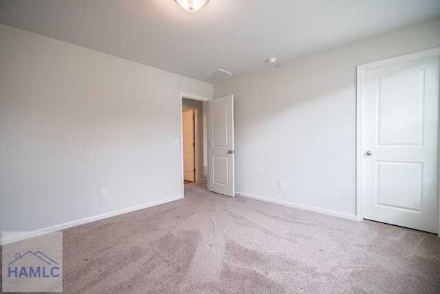 55 Enclave Way NE, Ludowici, GA 31316 - unfurnished bedroom featuring carpet flooring and baseboards