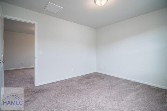 55 Enclave Way NE, Ludowici, GA 31316 - carpeted empty room featuring baseboards