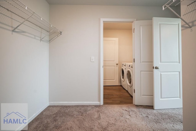 55 Enclave Way NE, Ludowici, GA 31316 - laundry room featuring washer and clothes dryer and carpet floors