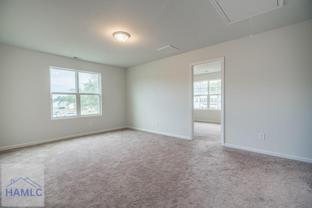 55 Enclave Way NE, Ludowici, GA 31316 - unfurnished room with attic access and carpet flooring