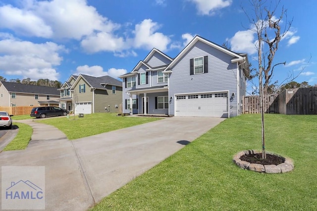 traditional-style home featuring a residential view, an attached garage, a front lawn, and fence