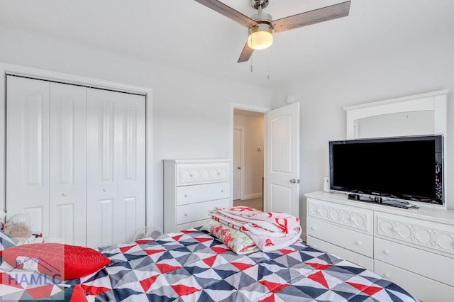 bedroom with a closet and ceiling fan