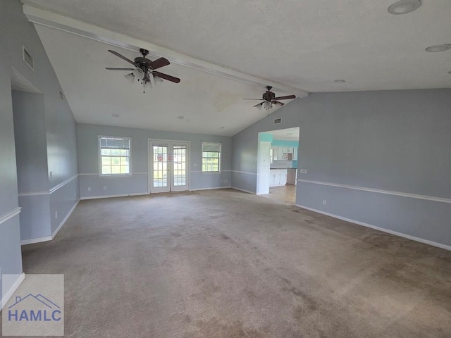 unfurnished living room with vaulted ceiling with beams, visible vents, carpet, and a ceiling fan