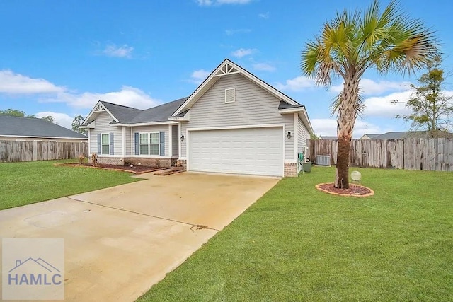 view of front of house featuring a garage, a front lawn, and central air condition unit