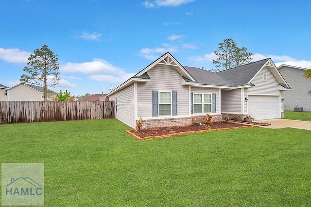 view of front facade with a garage and a front lawn