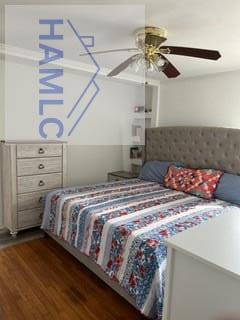 bedroom featuring a ceiling fan and dark wood finished floors