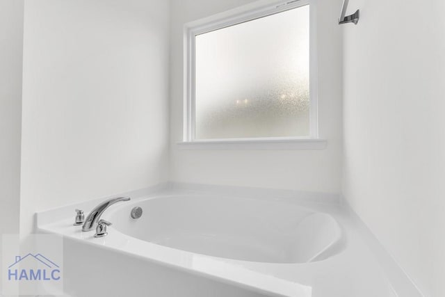 bathroom featuring a bath