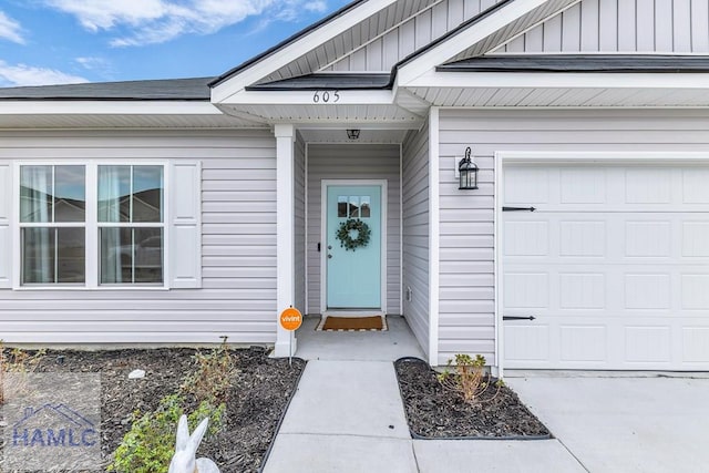 entrance to property with an attached garage