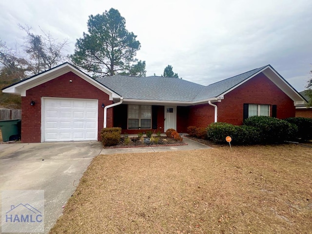 single story home featuring a garage