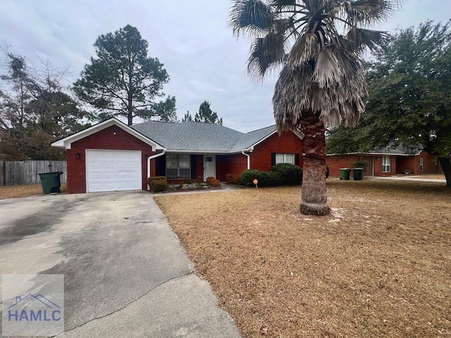 single story home featuring a garage