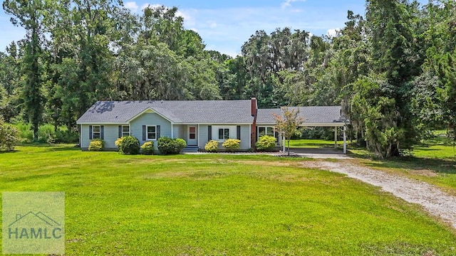 443 Martin Rd, Midway, GA 31320 - ranch-style home featuring driveway, a front yard, an attached carport, and a chimney