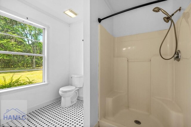 443 Martin Rd, Midway, GA 31320 - bathroom with healthy amount of natural light and a shower