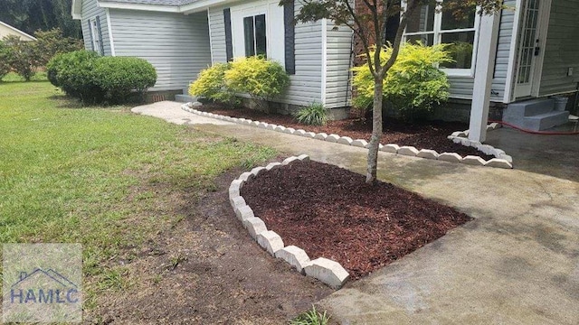 443 Martin Rd, Midway, GA 31320 - view of green lawn with entry steps