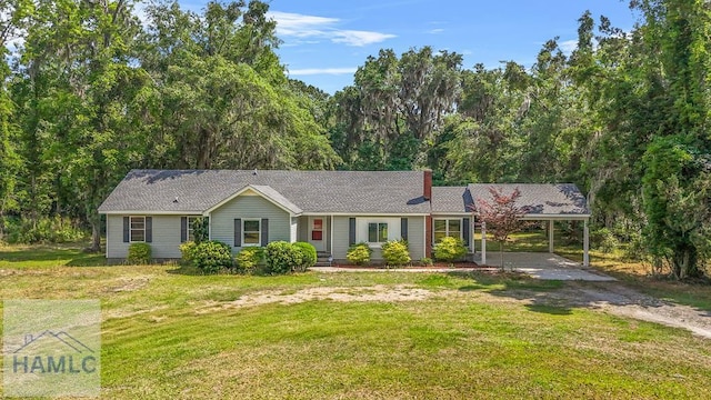 443 Martin Rd, Midway, GA 31320 - single story home featuring a carport, driveway, a chimney, and a front lawn