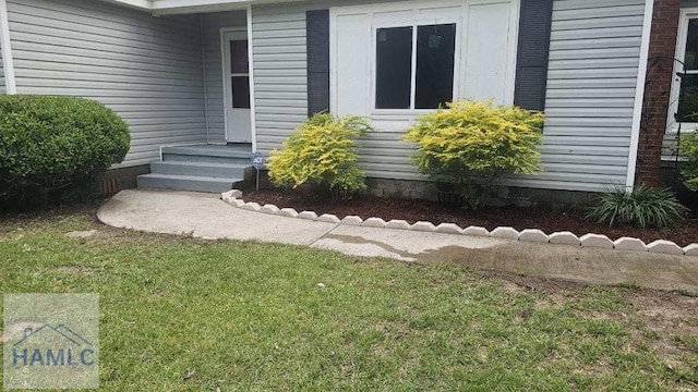 443 Martin Rd, Midway, GA 31320 - property entrance featuring a lawn