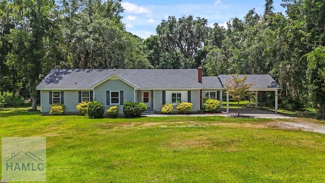 443 Martin Rd, Midway, GA 31320 - ranch-style house featuring driveway, a carport, a chimney, and a front yard
