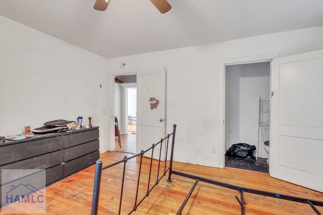 bedroom featuring wood-type flooring and ceiling fan