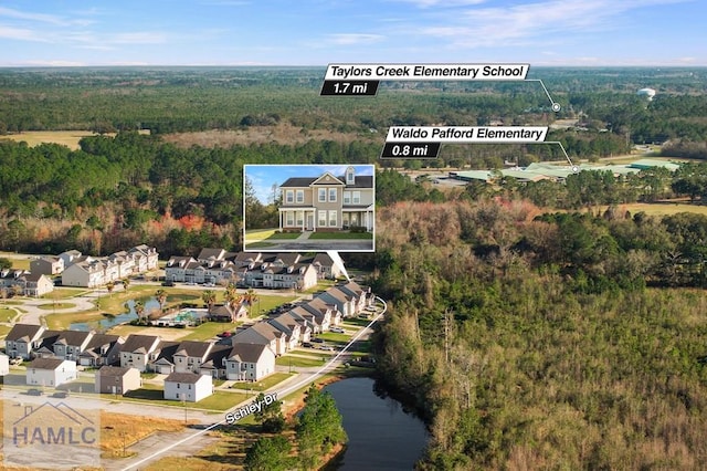 aerial view with a view of trees and a residential view