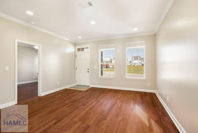 entrance foyer with visible vents, baseboards, ornamental molding, recessed lighting, and wood finished floors