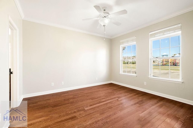 unfurnished room with dark wood-type flooring, a ceiling fan, baseboards, and ornamental molding