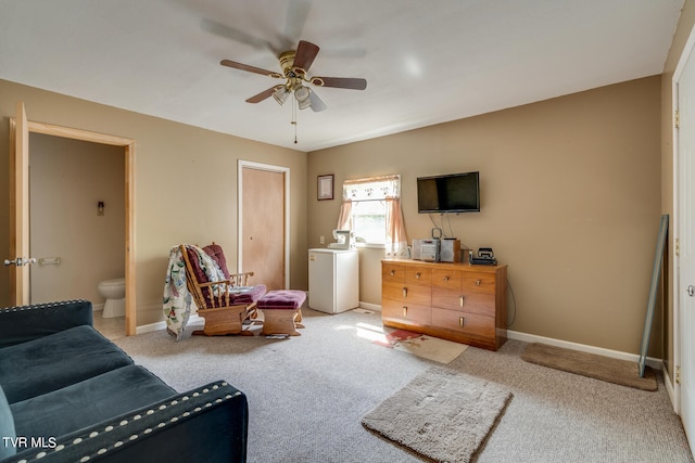 carpeted living room with ceiling fan