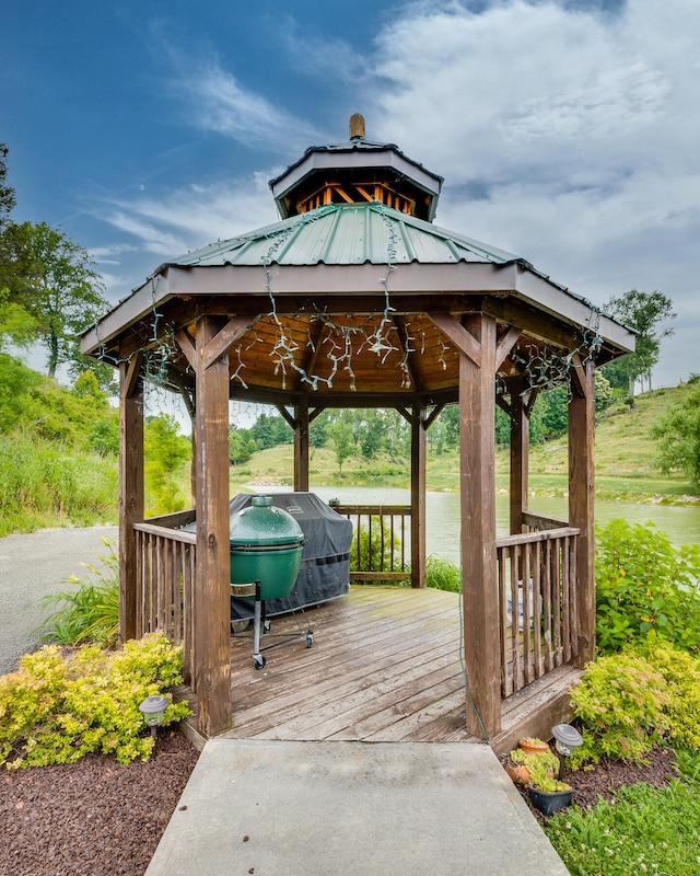 wooden deck featuring a gazebo