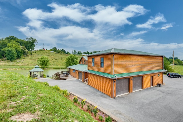 view of side of property with a garage